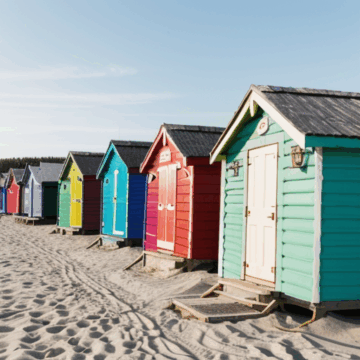 Explore Vibrant Beach Huts: A Colorful Coastal Journey