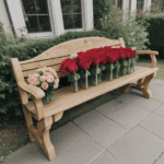 Floral display of colorful roses on a wooden bench, inviting romance.