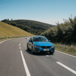 A car driving down a steep hill, capturing the essence of adventure and thrill.