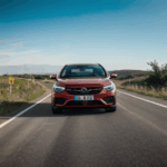 A car's driving journey down a hill, full of excitement and thrill.