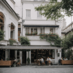 A charming cafe terrace basking in morning sunlight, perfect for a serene start to the day.