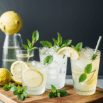 Citrus mint lemonade in a glass, highlighting the refreshing combination of lemon and mint.