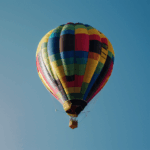 A stunning image of a colorful balloon ride, capturing the essence of travel and adventure in the sky.