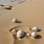 A close-up of seashells on sunlit sand, highlighting the intricate details and natural beauty of these coastal treasures.