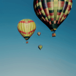 A colorful hot air balloon journey above the landscape, providing a captivating and adventurous experience.