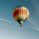 A dreamy balloon flight among the clouds, offering an enchanting and serene aerial adventure.