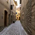 A quaint alleyway in an old European town, perfect for a peaceful stroll.