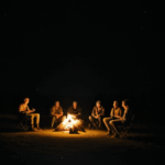 The captivating glow of a campfire lighting up the night.