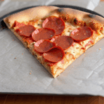 A pizza masterpiece with a crispy crust and mouthwatering toppings