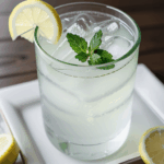 Classic lemonade with fresh mint, served chilled with ice.