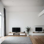 A modern minimalist living room featuring sleek furniture and a clutter-free design, embodying simplicity and style.