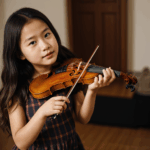 A young musician immersed in her violin practice, radiating musical inspiration.