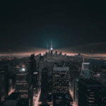 A panoramic city night view, offering a glimpse into the vibrant life of a city adorned with countless glowing lights.