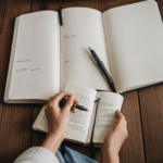 A journal on a table, representing the benefits of writing for personal growth.