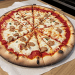 A perfectly baked pizza with a mix of savory toppings and gooey cheese