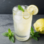 Cool and citrusy summer drink: lemonade with mint and ice.