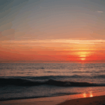 Relaxing sunset views where the ocean meets the sky in vibrant, warm hues.
