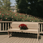 Roses artfully arranged on a charming wooden bench, showcasing vibrant colors.