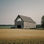 Rural architecture showcased by a wooden barn in green fields.
