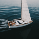 A sailboat escape on a calm sea, where the classic vessel captures the essence of nautical serenity.