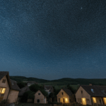 A quiet village illuminated by a magnificent starry sky, showcasing nature's beauty.