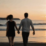 Couple on a romantic getaway, walking at sunset.