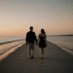 Couple hand in hand, experiencing the beauty of sunset.