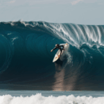 A surfing enthusiast tackling a massive wave, showcasing their commitment to the sport.