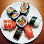 A moment of sushi indulgence captured with a plate full of colorful and flavorful rolls.