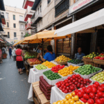 Variety of tropical fruits on display at a bustling market, highlighting vibrant and fresh produce.
