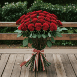 A charming rose bouquet on a wooden bench, highlighting nature's beauty.